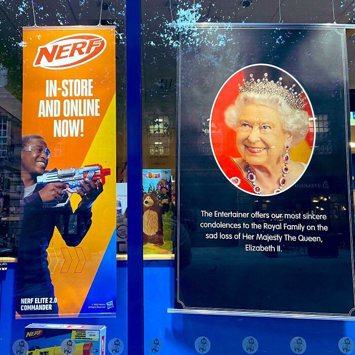Nerf toy advertisement next to a condolence message for Queen Elizabeth II, showcasing an advertising placement fail.