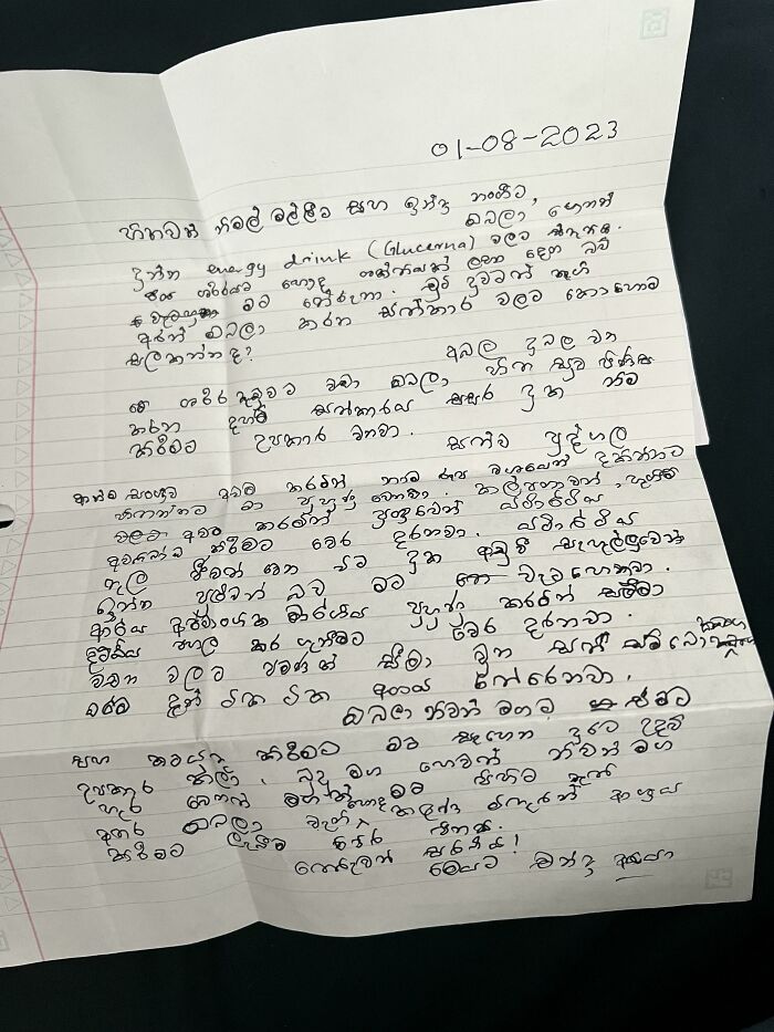 Handwritten note in a foreign language among curious things people discovered and had no idea what they were. Handwritten note in a foreign language among curious things people discovered and had no idea what they were.