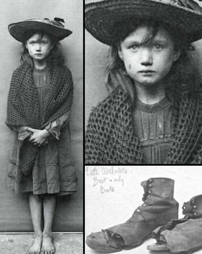 Black and white old photo of a barefoot girl in worn clothes and a hat showing people’s lives from a different time.