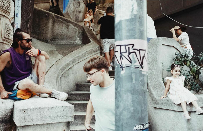 Men and children captured candidly on concrete steps in a vibrant urban scene showing real life in Turkey.