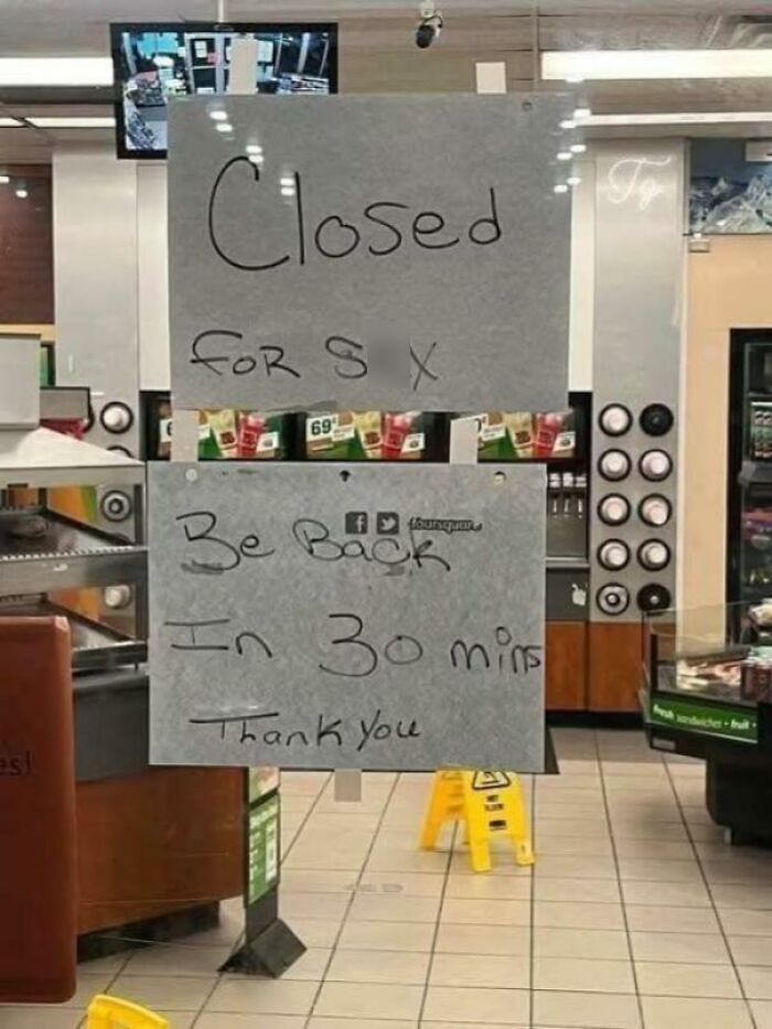 Handwritten sign on a store window saying closed for s*x, combining funny and bizarre elements of holy and cursed images.