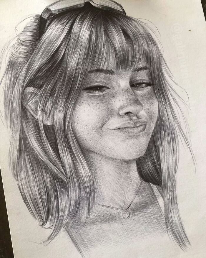 Portrait of a smiling young woman with detailed hair and freckles, created using only a ballpoint pen in hyper-realistic style.