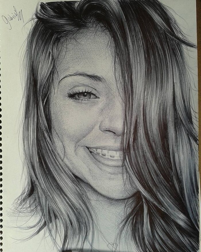 Realistic ballpoint pen portrait of a smiling woman with hair partially covering her face, showcasing detailed ballpoint pen art.