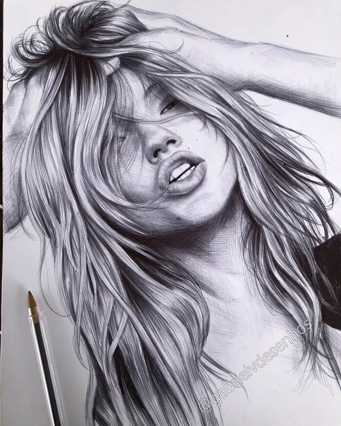 Hyper-realistic ballpoint pen portrait of a woman with flowing hair, showcasing detailed shading and lifelike texture.