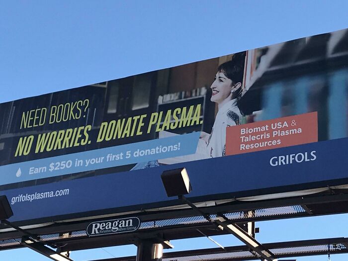 Billboard in the US promoting plasma donation as a way to earn money, reflecting a dystopian real-life scene.