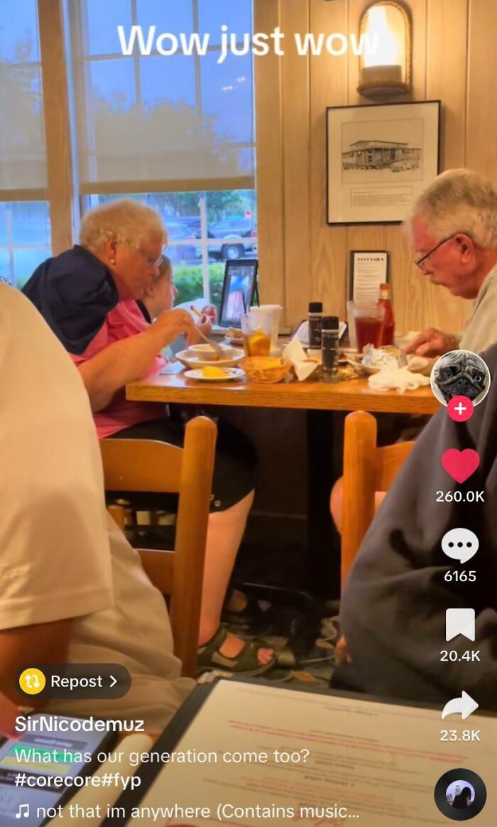 Elderly people dining in a restaurant while watching a tablet screen with TikTok screenshots that inspire smart thoughts.