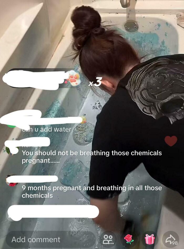 Person cleaning a bathtub with chemical stains, featured in 89 screenshots from TikTok that might make you feel very smart.