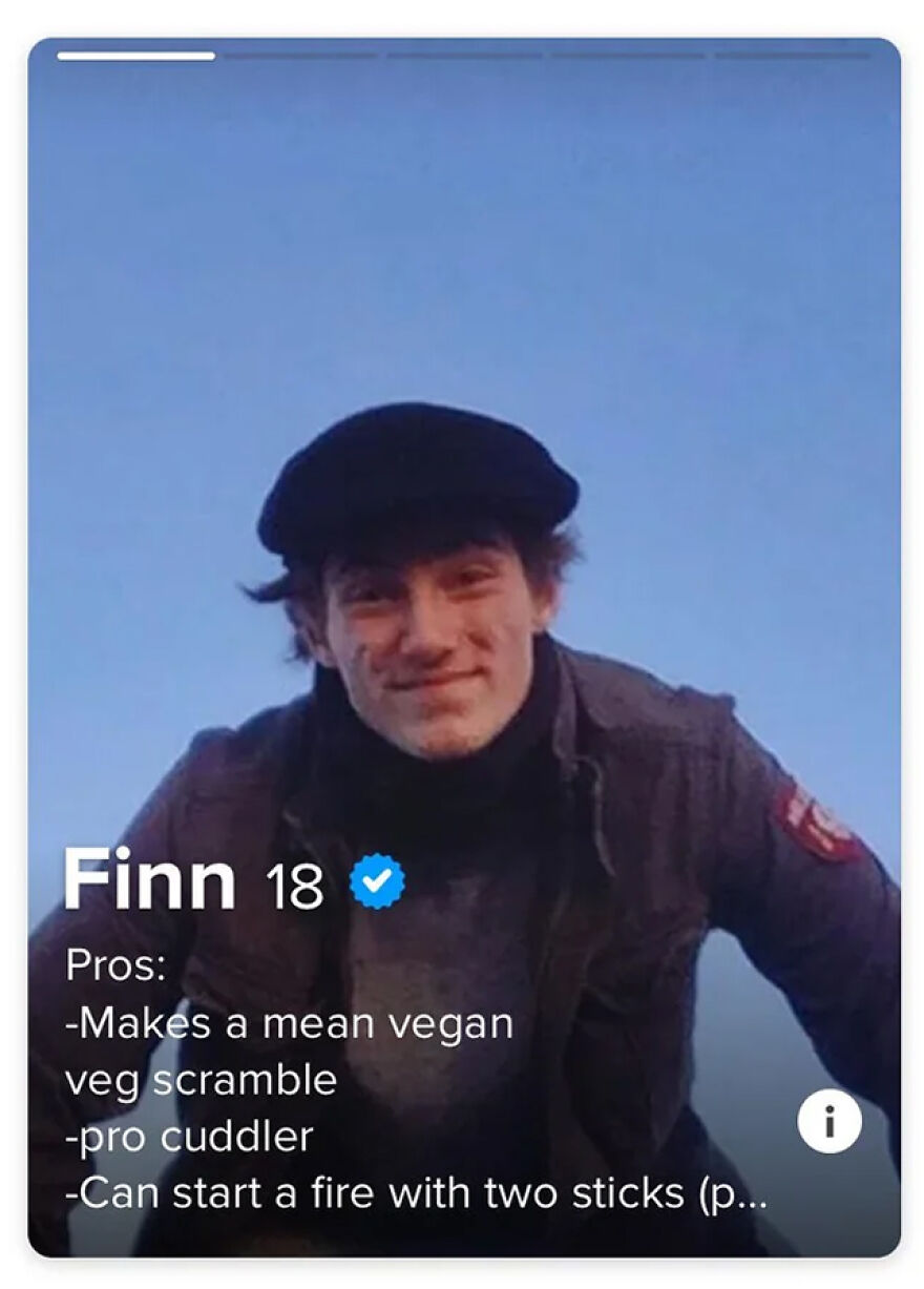 Young man with a black hat smiling in a Tinder profile showcasing creative Tinder bios for guys to attract matches.