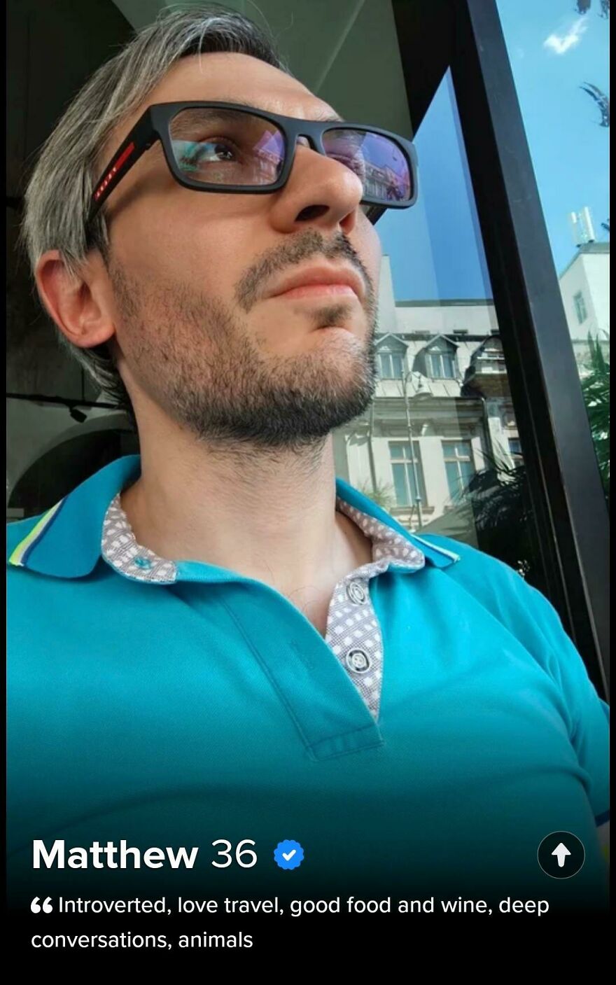 Man wearing sunglasses and a blue shirt, showing a Tinder bio example for best Tinder bios for guys inspiration.