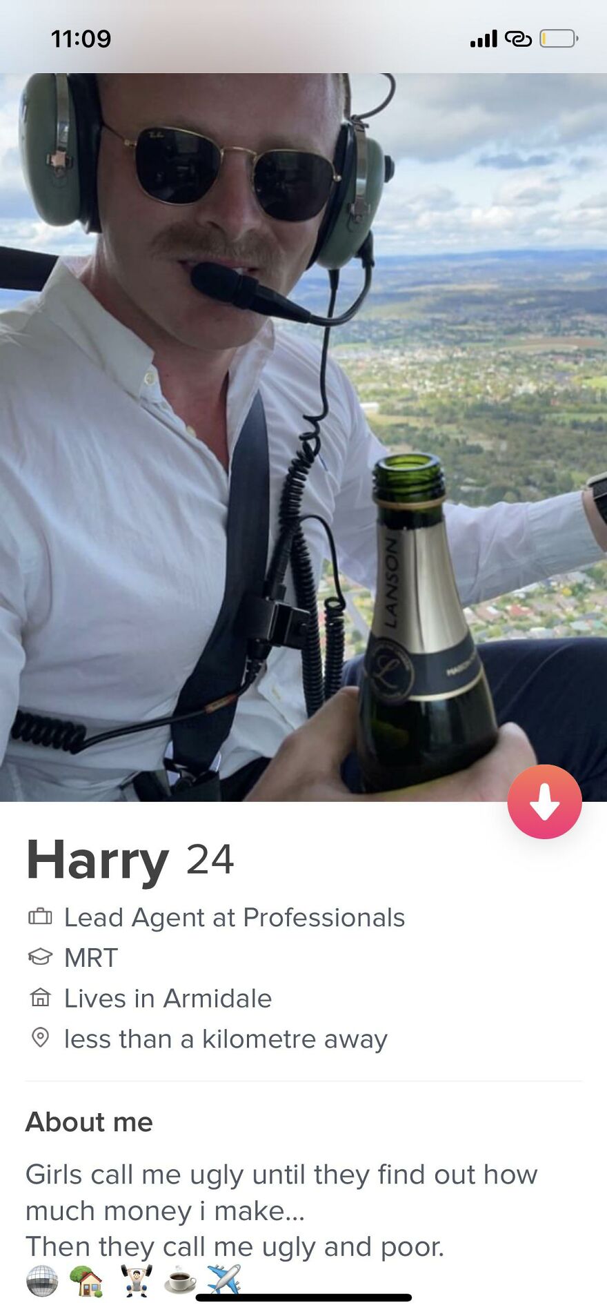 Man wearing headset and sunglasses in helicopter holding a bottle, example of best Tinder bios for guys profile photo.