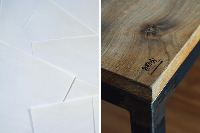Stack of white envelopes on the left and close-up of wooden table corner on the right, related to toddlers or alligator poll.