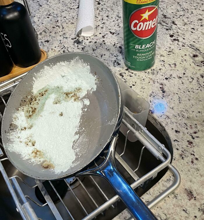 Dirty pan covered in cleaning powder left in a dishwasher, illustrating awful roommates and frustrating household messes.