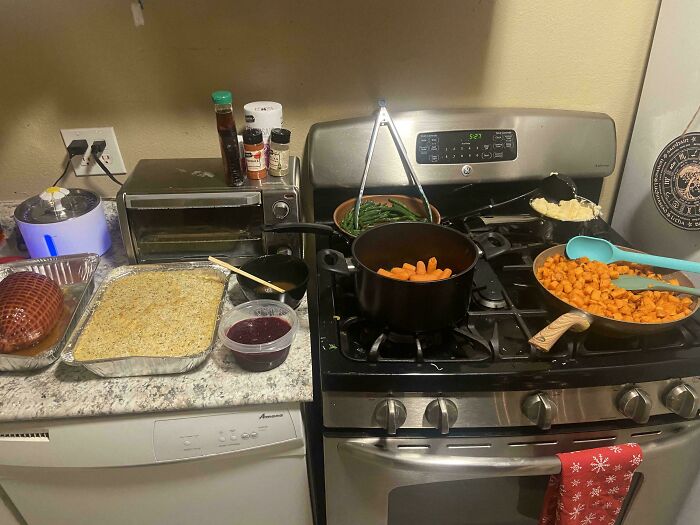 Prepared home-cooked meal on stove and counter representing wholesome moms being their amazing selves.