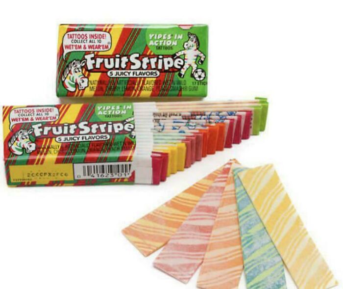 Vintage Fruit Stripe gum packs with colorful chewing gum strips, a nostalgic treat to make you feel old as heck.