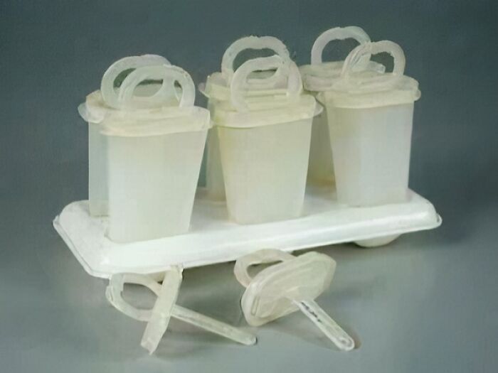 Homemade popsicle mold made from recycled plastic containers, evoking nostalgic memories and old age reminders.