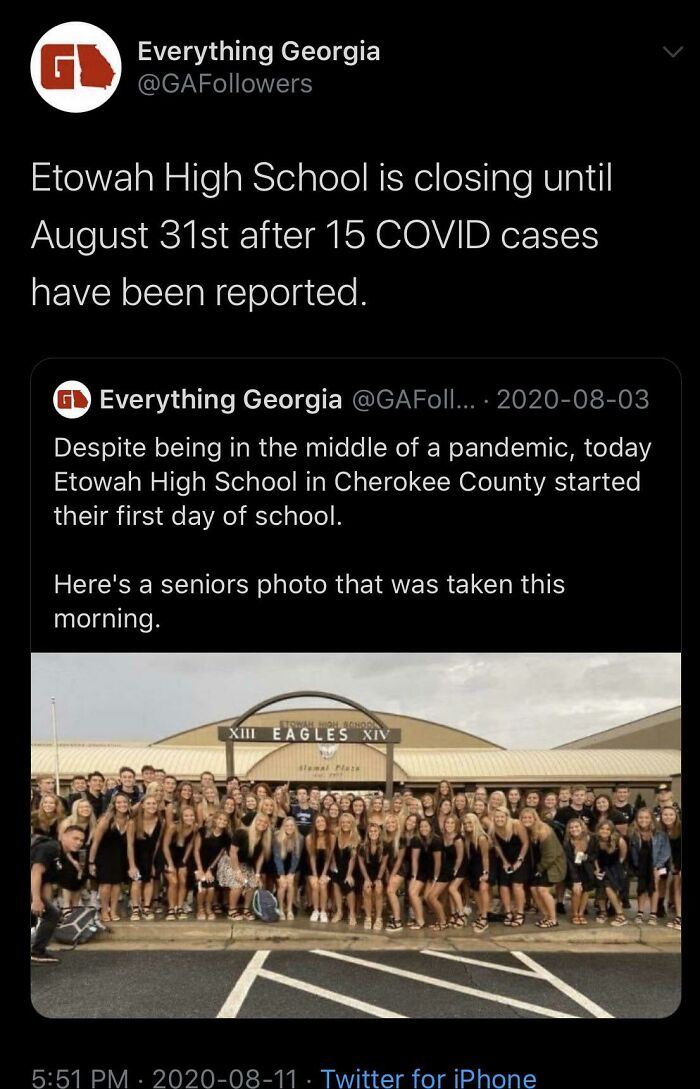 High school seniors group photo before school closure due to COVID cases, illustrating actions meet consequences in pandemic risk.