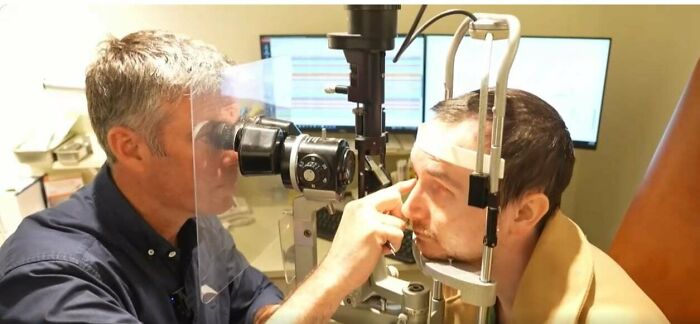 Eye doctor conducting an eye exam using a slit lamp to check patient’s vision and eye health, inspiring facts concept.