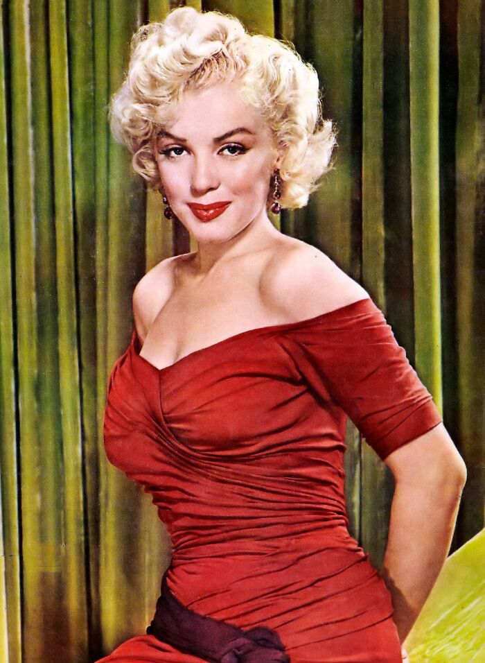 Portrait of a classic Hollywood actress in a red dress, representing themes of famous historical quotes and myths.