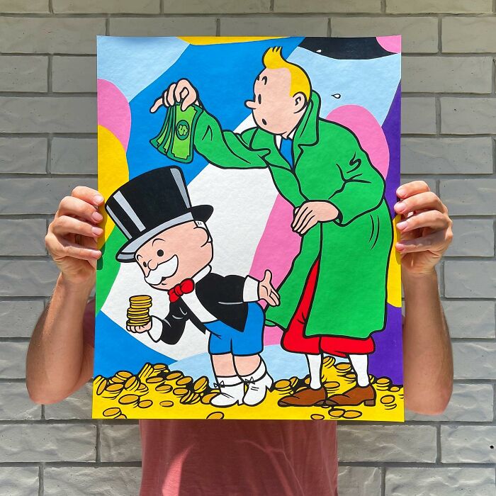 Person holding pop culture and cartoon character mash-ups artwork featuring colorful comic-style characters and coins.