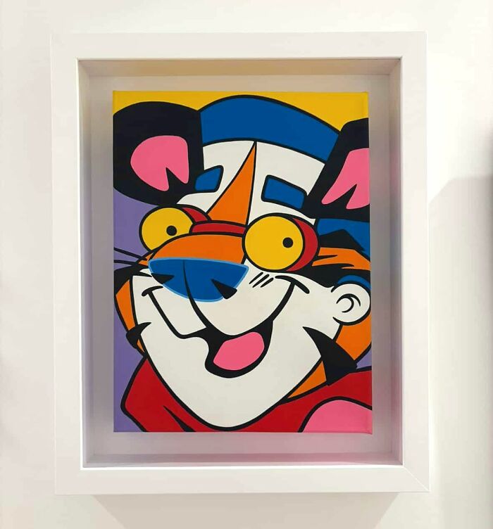 Framed colorful pop culture and cartoon character mash-up artwork with bold shapes and vibrant colors, showcasing pop mash style.
