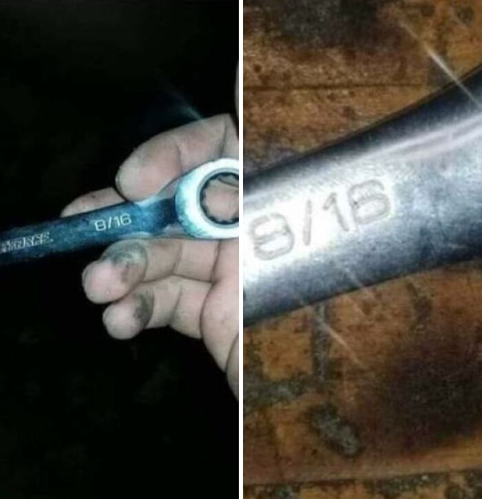 Car mechanics showing a dirty 8/16 wrench to prove the unusual tool size they were working with.
