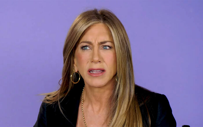 Jennifer Aniston reacting with surprise during an interview about learning Reese Witherspoon's real name after 25 years. Jennifer Aniston reacting with surprise during an interview about learning Reese Witherspoon's real name after 25 years.