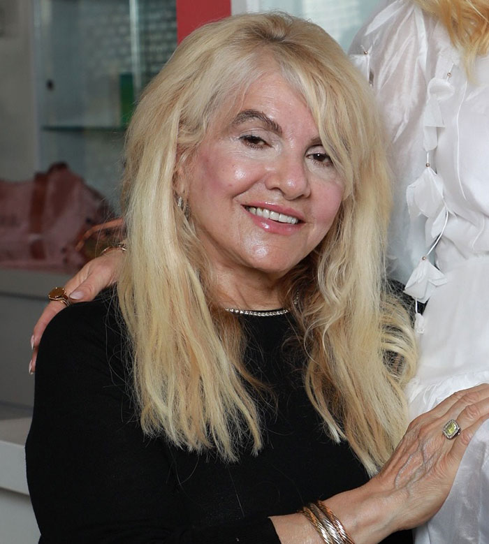 Older woman with blonde hair smiling indoors, relating to celebrity facialist and $90,000 repairs claims. Older woman with blonde hair smiling indoors, relating to celebrity facialist and $90,000 repairs claims.