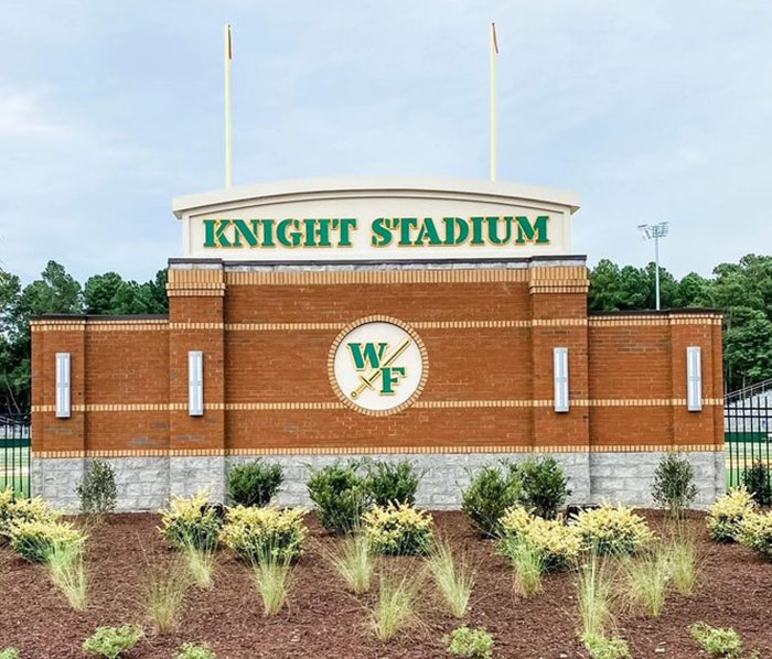 Knight Stadium entrance at school linked to teacher arrested for using poop spray causing repairs and sickness. Knight Stadium entrance at school linked to teacher arrested for using poop spray causing repairs and sickness.