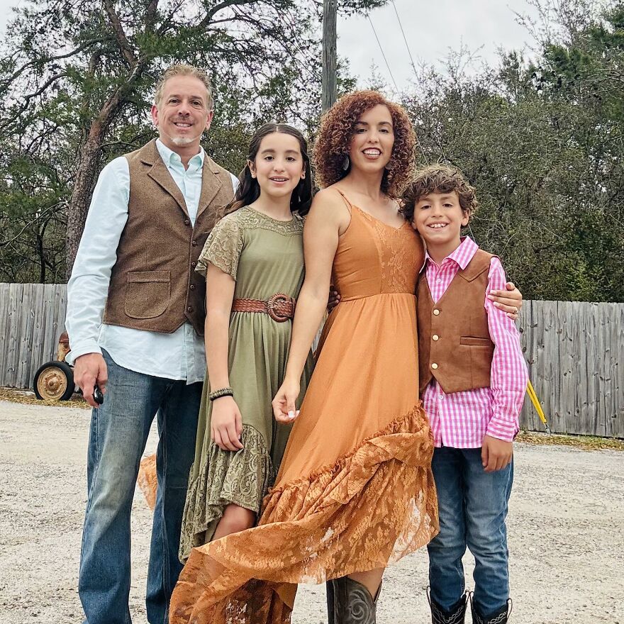 Family posing outdoors with woman mistaken for Phillies Karen after home run ball meltdown in a casual setting. Family posing outdoors with woman mistaken for Phillies Karen after home run ball meltdown in a casual setting.
