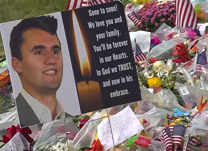 Memorial with flowers and a tribute sign for Charlie Kirk, related to FBI DNA evidence and chilling note. Memorial with flowers and a tribute sign for Charlie Kirk, related to FBI DNA evidence and chilling note.