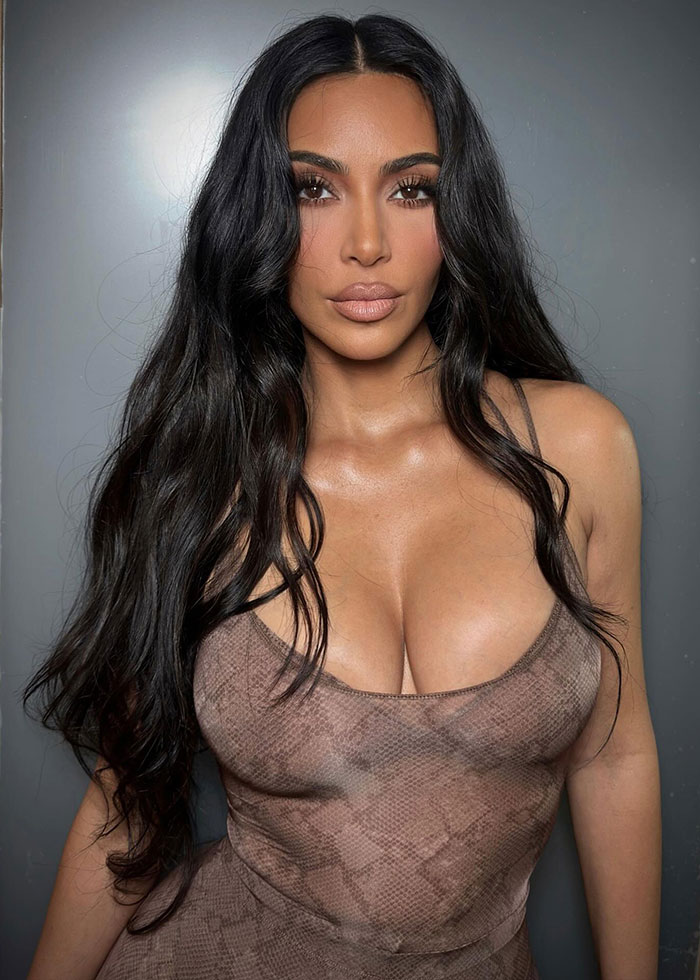 Woman with long dark hair wearing a snake-print top, representing Kanye West and daughter North public betrayal list reaction. Woman with long dark hair wearing a snake-print top, representing Kanye West and daughter North public betrayal list reaction.