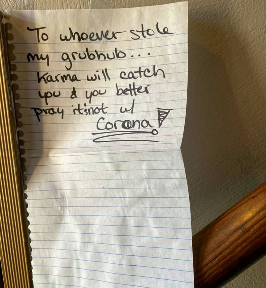 Handwritten warning note threatening karma to the grubhub thief, evoking a desire to live in the middle of nowhere with no neighbors.
