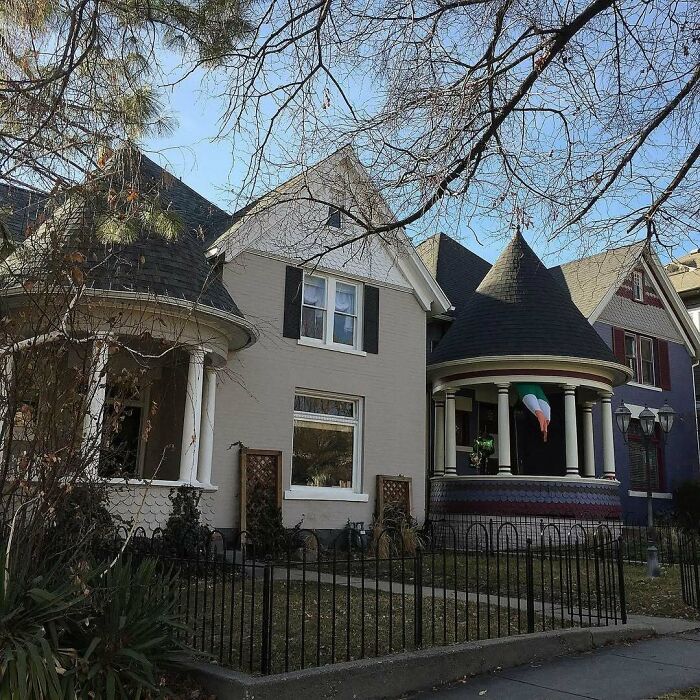 Charming old homes with unique architectural details and cozy porches in a quiet neighborhood setting.