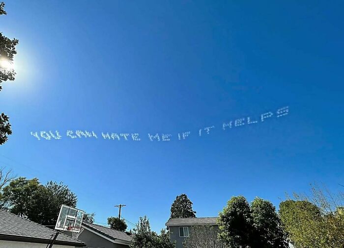 Skywriting message over a residential area showing an example of unbearable neighbors causing public disturbance.