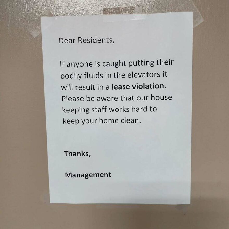 Sign warning residents about a lease violation for putting bodily fluids in elevators in a remote living area with no neighbors.