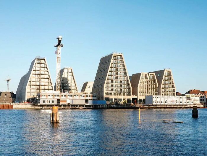 Modern Danish architecture by the waterfront, showcasing unique buildings that highlight Denmark’s cooler design style.