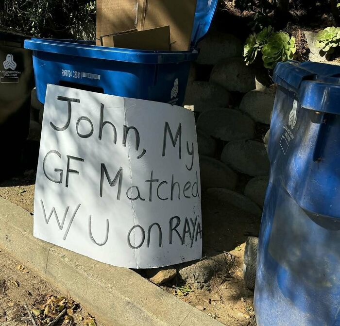 Handwritten neighbor sign placed between blue recycling bins, part of unbearable neighbors collection showing awkward confrontations.