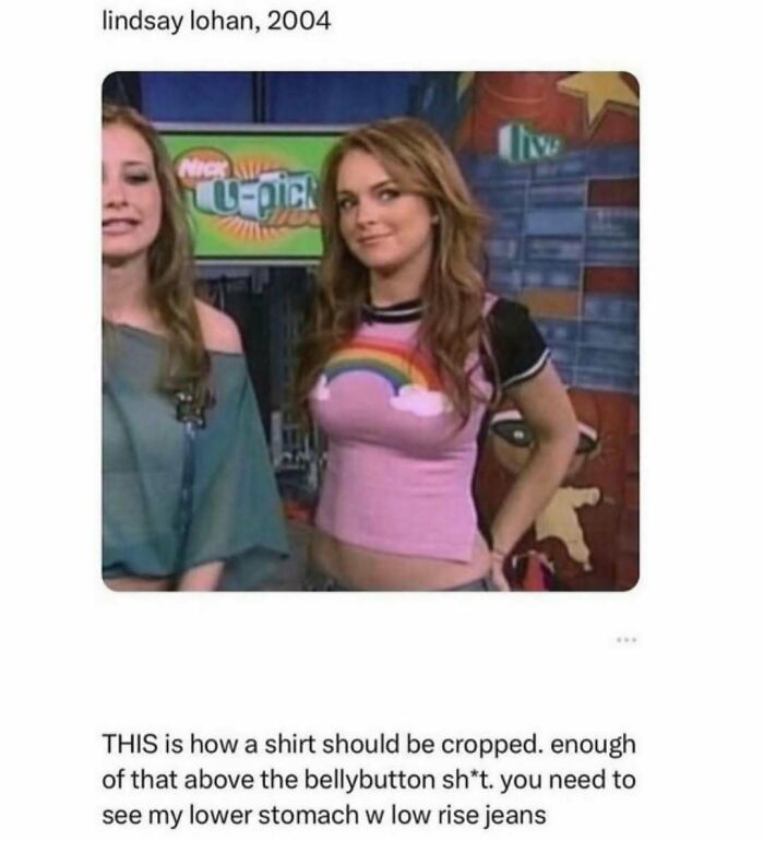 Lindsay Lohan in 2004 wearing a cropped shirt with a rainbow design, relatable to navigating the world as just a girl.