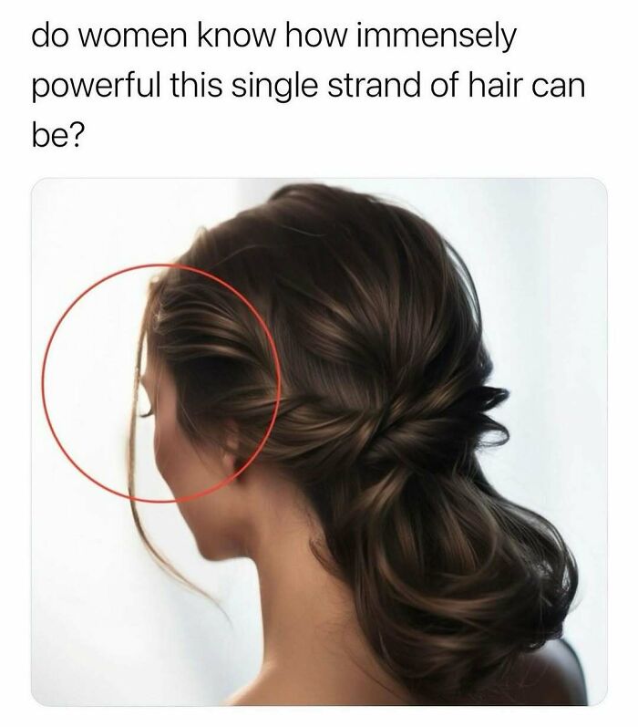 A woman with dark hair in a loose bun, a single strand of hair highlighted, symbolizing relatable girl moments.