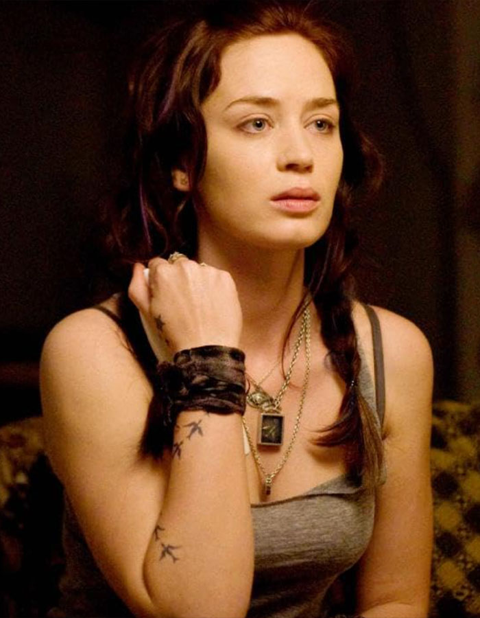 Emily Blunt in a sleeveless top with braided hair, sparking plastic surgery rumors with her natural look. Emily Blunt in a sleeveless top with braided hair, sparking plastic surgery rumors with her natural look.