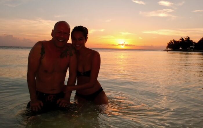 Bruce Willis and his wife enjoying a sunset swim as she supports his move amid dementia battle. Bruce Willis and his wife enjoying a sunset swim as she supports his move amid dementia battle.