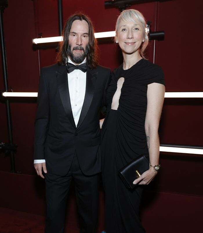 Keanu Reeves and his girlfriend dressed elegantly at an event, addressing marriage rumors in a public setting. Keanu Reeves and his girlfriend dressed elegantly at an event, addressing marriage rumors in a public setting.