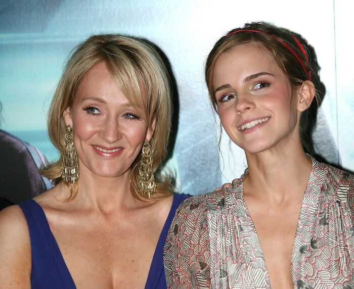 J.K. Rowling and Emma Watson smiling together at a public event, related to Rowling’s social media response. J.K. Rowling and Emma Watson smiling together at a public event, related to Rowling’s social media response.