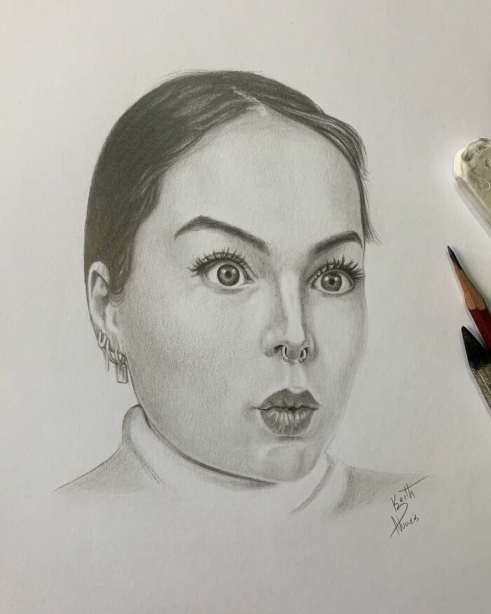 Realistic pencil portrait of a woman with detailed facial features capturing every tiny detail in the drawing.