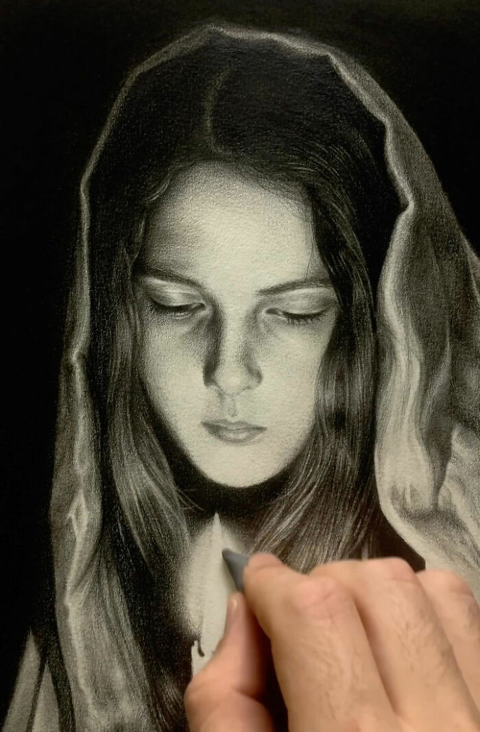 Hand drawing an incredible pencil portrait of a girl with detailed shading capturing every tiny detail on textured paper.