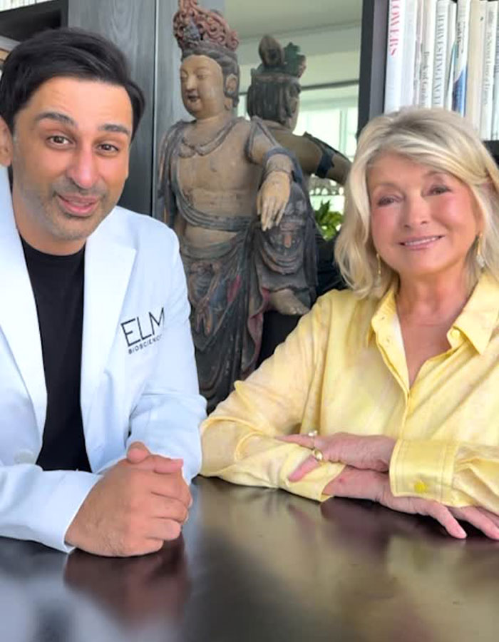 Martha Stewart sitting with a man in a white coat, sparking plastic surgery rumors in a casual indoor setting. Martha Stewart sitting with a man in a white coat, sparking plastic surgery rumors in a casual indoor setting.