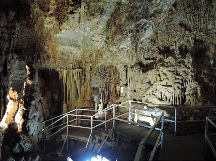 Interior view of a cave with rock formations where the mysterious Petralona Man skull was found 60 years ago. Interior view of a cave with rock formations where the mysterious Petralona Man skull was found 60 years ago.