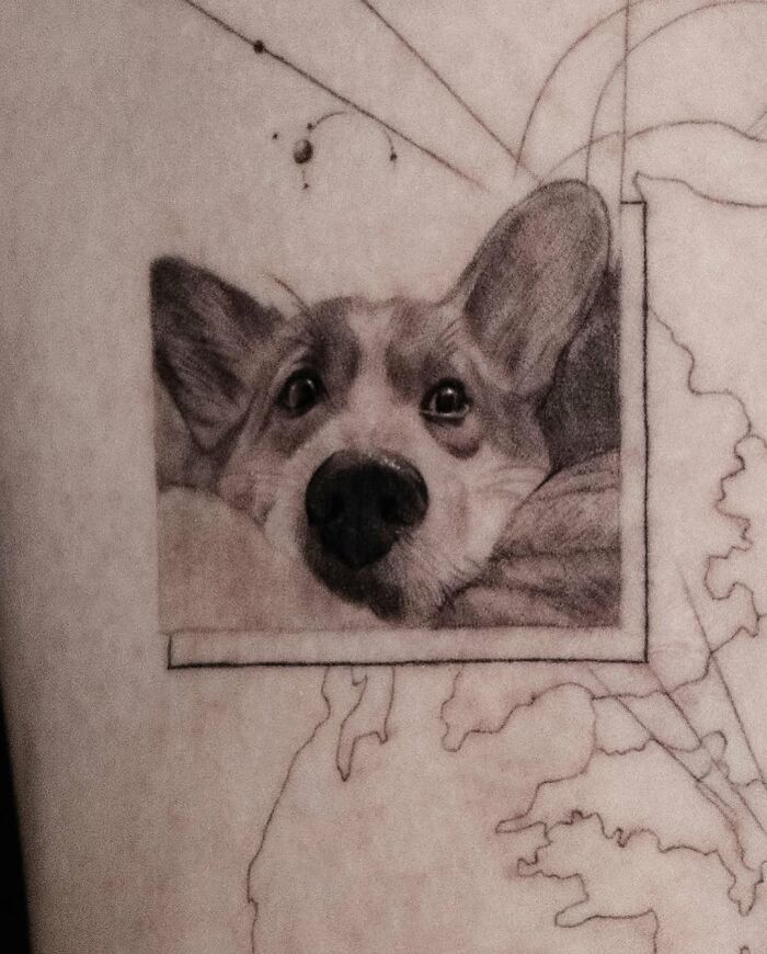 Realistic emotional pet tattoo of a dog by a Korean tattoo artist specializing in cats, dogs, and rabbits.