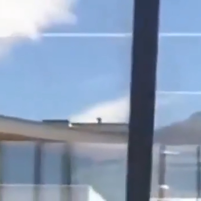 View of a cloudy sky with contrails and a rooftop, related to Charlie Kirk predicted passing in an eerie post. View of a cloudy sky with contrails and a rooftop, related to Charlie Kirk predicted passing in an eerie post.