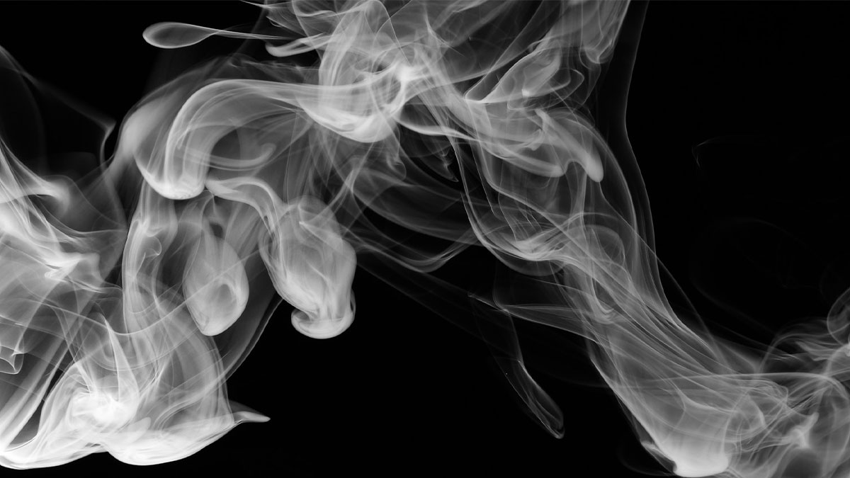 Abstract white smoke swirling on a black background representing money-saving tips creatively and visually.